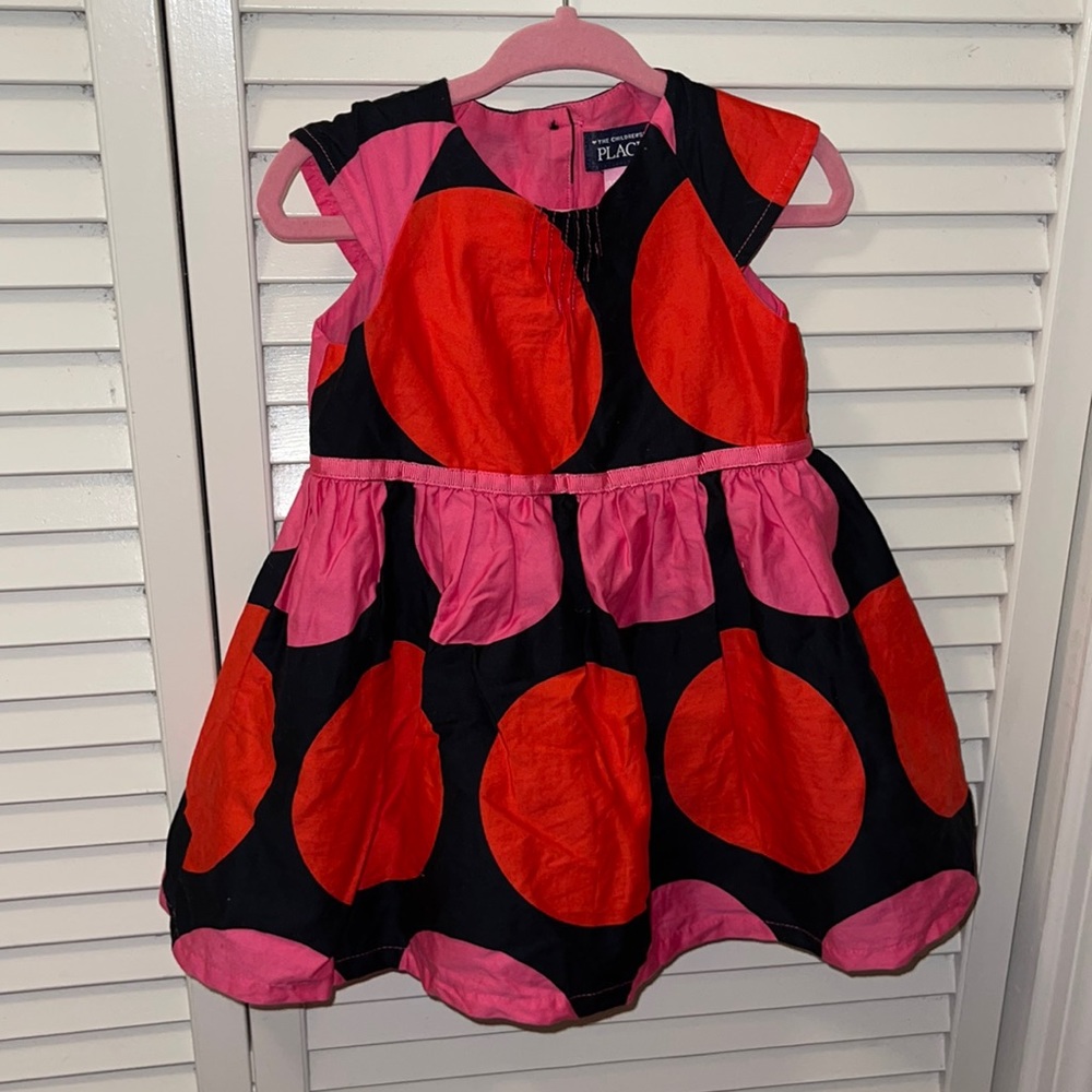 Pok a dot pink and black sleeveless dress